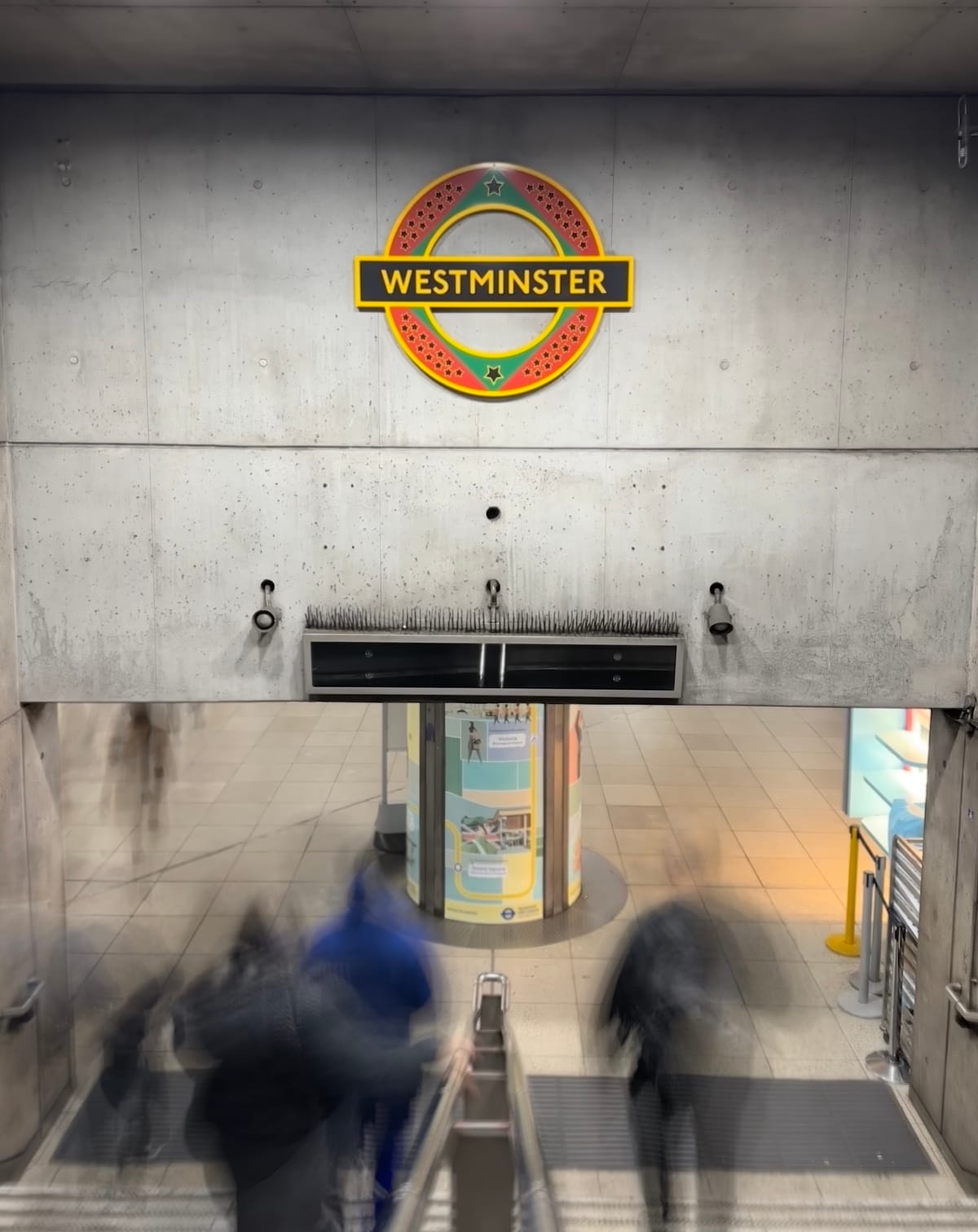 Long exposure photo of a Pan African London Underground roundel, a permanent artwork by the Ghanaian British artist Larry Achiampong.